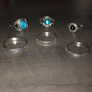 Six piece stone and silver banded rings